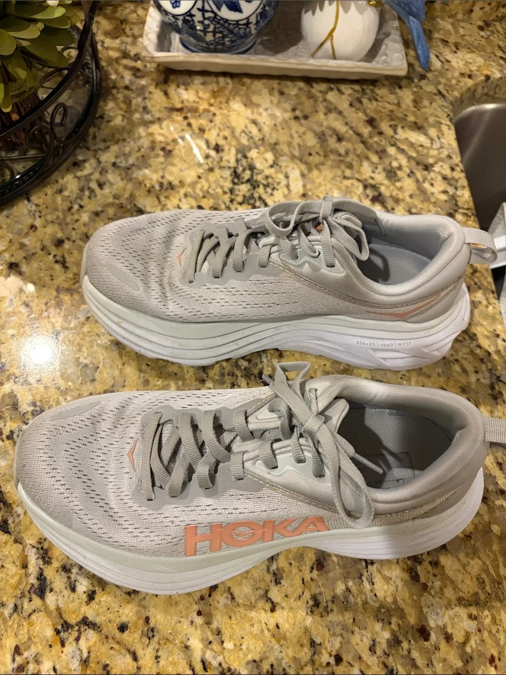 Hoka Women's Running Shoes in Light Gray with Subtle Peach Accents